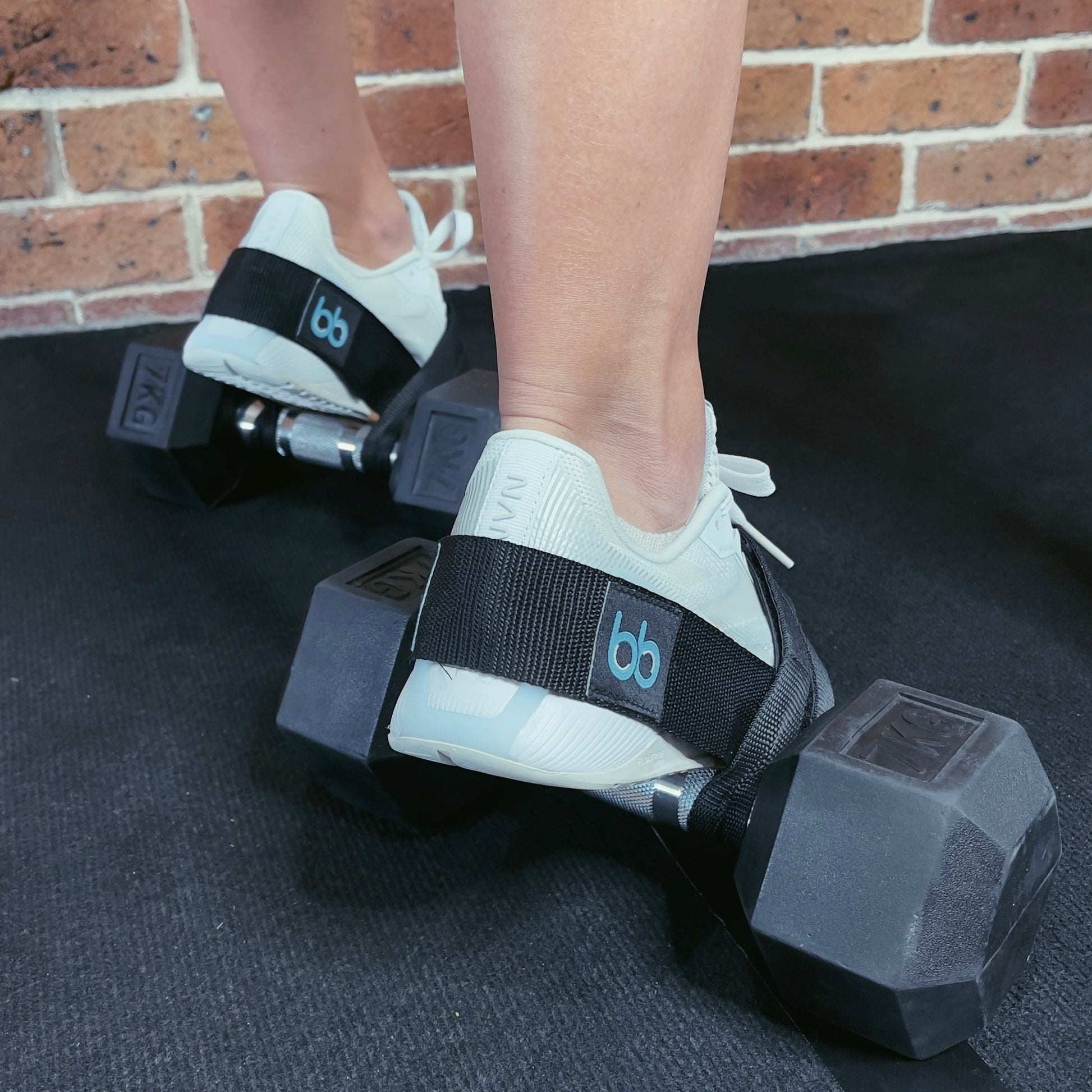 Leg day needs the best in gym equipment. This gym goer never trains her legs without getting in a set of leg extensions, hamstring curls or weighted pull ups. The fittest woman in the gym are using the bb foot strap for all their leg workouts. Endless possibilities for muscle gain and strengthening